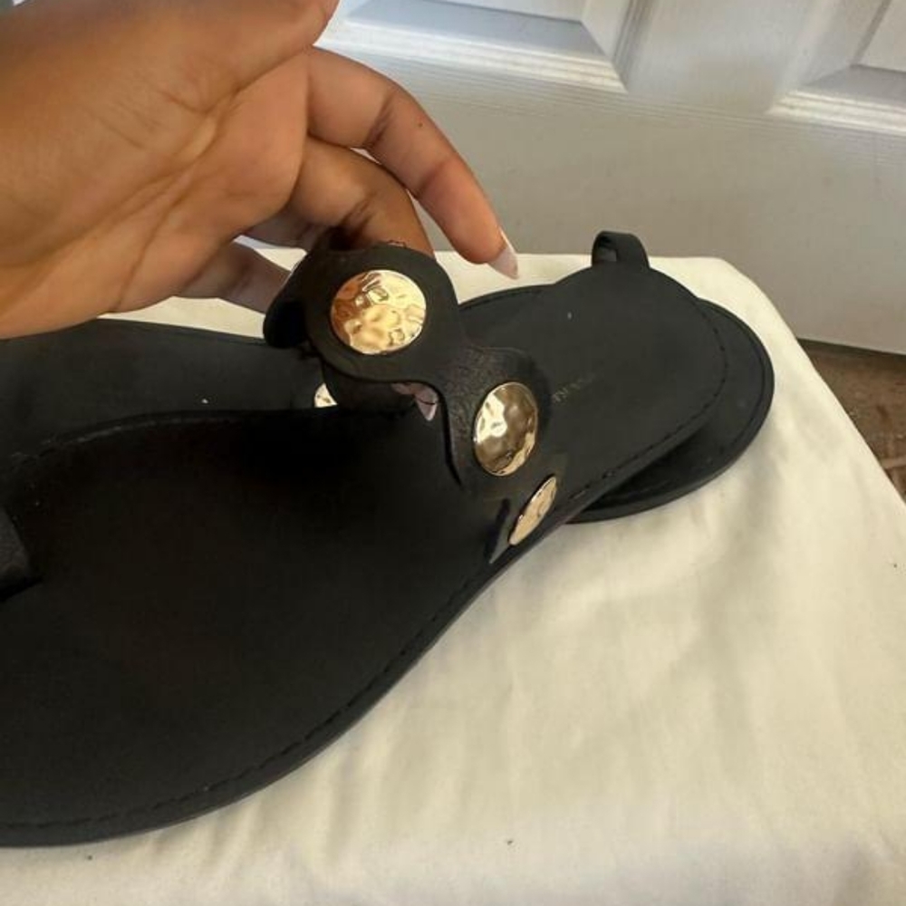 Black sandals with gold accessories | Banana Republic